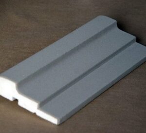 Exterior moulding profiles expertly engineered from high-grade EPS, featuring intricate traditional detailing and a durable cement-synthetic finish that encapsulates a refined blend of heritage elegance and modern resilience.
