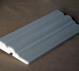 Exterior moulding profiles featuring advanced EPS construction with intricate detailing accentuated by a robust cement-synthetic finish, reflecting a harmonious blend of historic craftsmanship and modern durability.